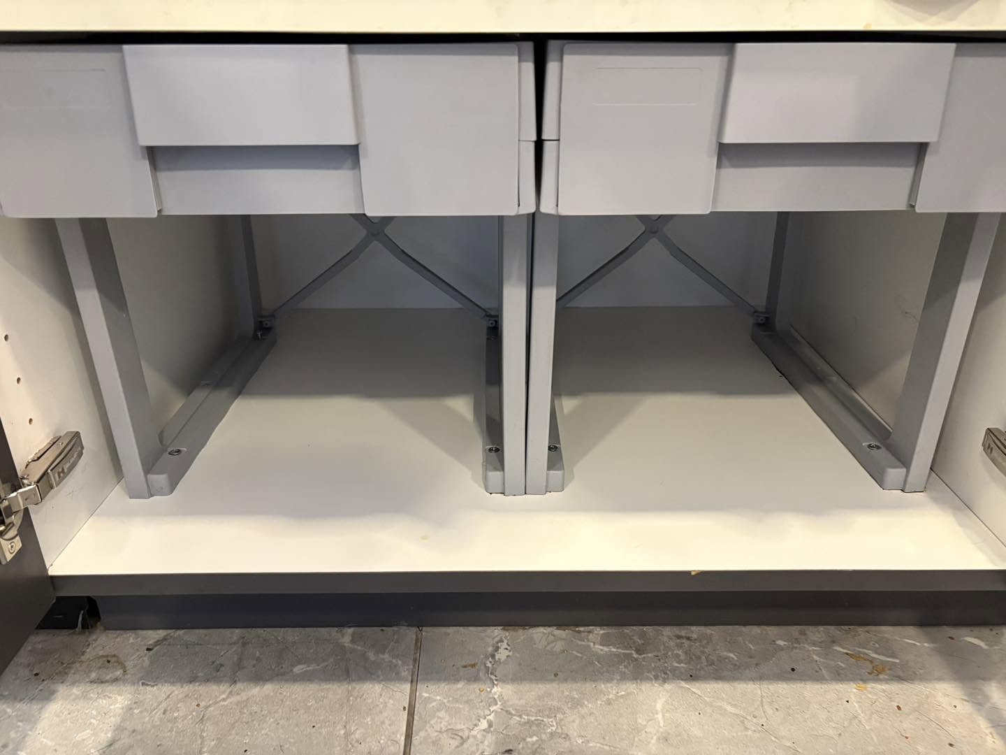 Pristine white cabinet interior after sanitizing