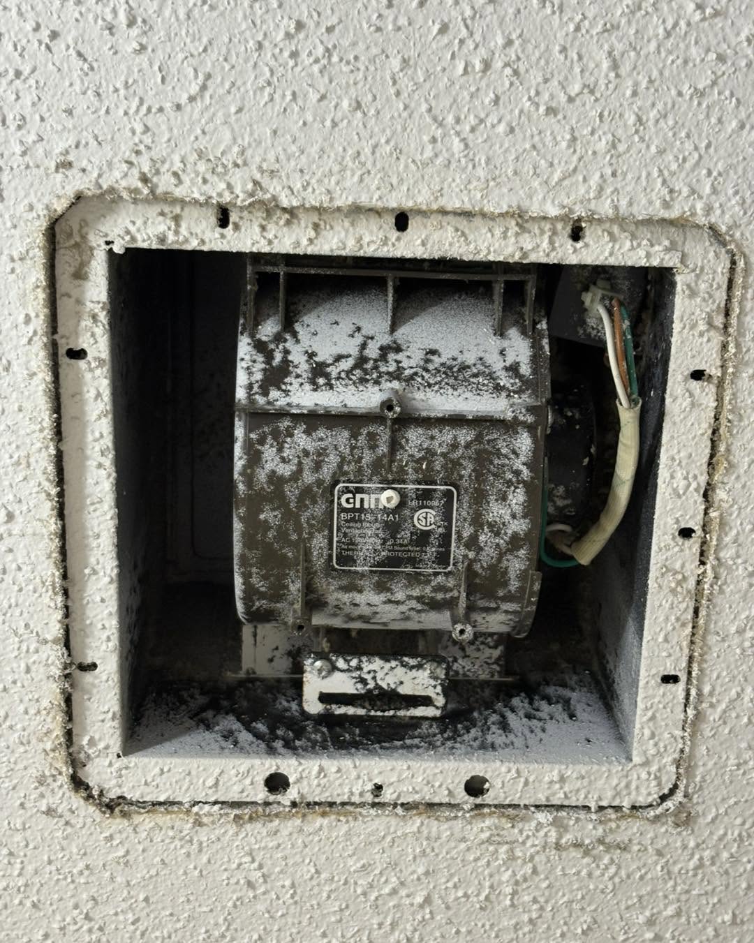 Exhaust fan housing detailed and cleared of dust